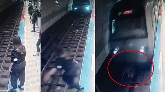 دختر جوان خود را زیر قطار مترو انداخت! + ویدئو