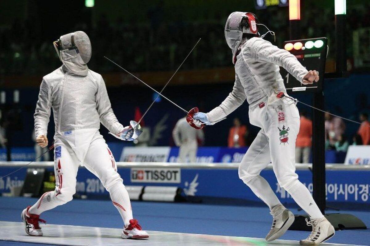 حمل مشعل بازی‌های آسیایی توسط ورزشکار ایران+ عکس