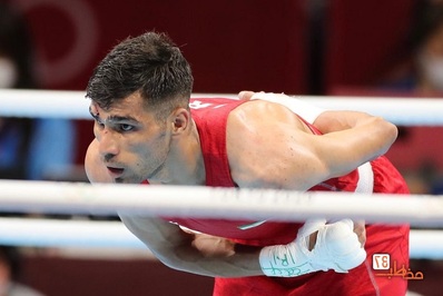 عکس + المپیک ۲۰۲۰ توکیو، دانیال شه بخش بوکسور ایران با صورت خونی پیروز شد