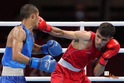 عکس + المپیک ۲۰۲۰ توکیو، دانیال شه بخش بوکسور ایران با صورت خونی پیروز شد